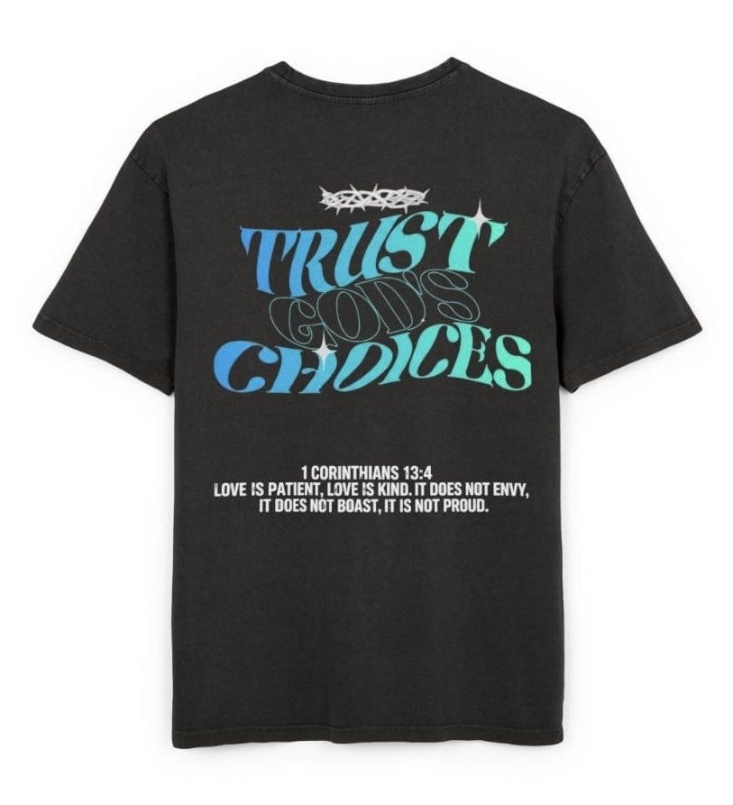 Ocean tee, back: Trust God's Choices in blue and teal under a thorn crown, 1 Corinthians 13:4 printed in white below